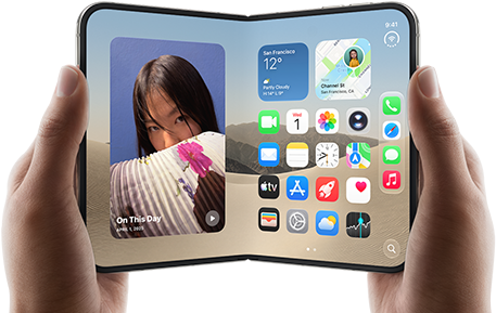 iPhone Duo, Star White color, held by two hands in landscape orientation, unfolded, interior screen displays photos on the left, apps on the right